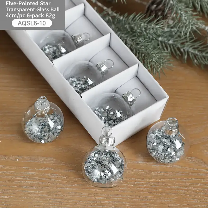 Boxed transparent glass Christmas ornaments with snowflake sequins