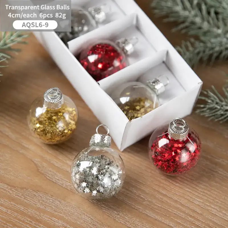 Boxed transparent glass Christmas ornaments with snowflake sequins