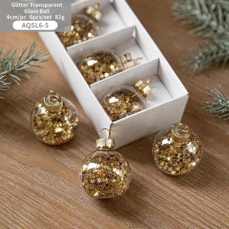Boxed transparent glass Christmas ornaments with snowflake sequins