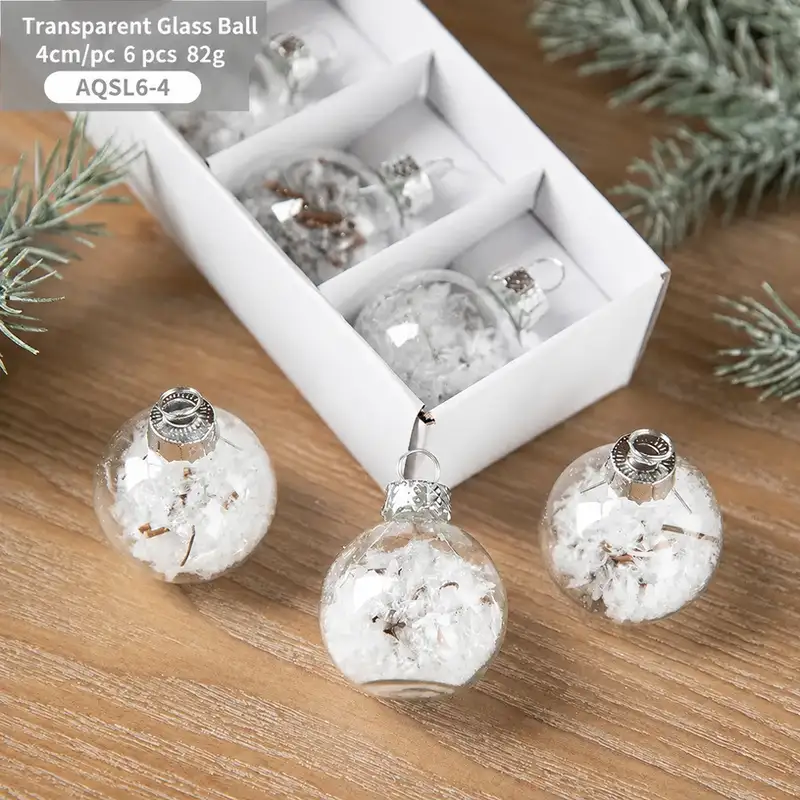 Boxed transparent glass Christmas ornaments with snowflake sequins