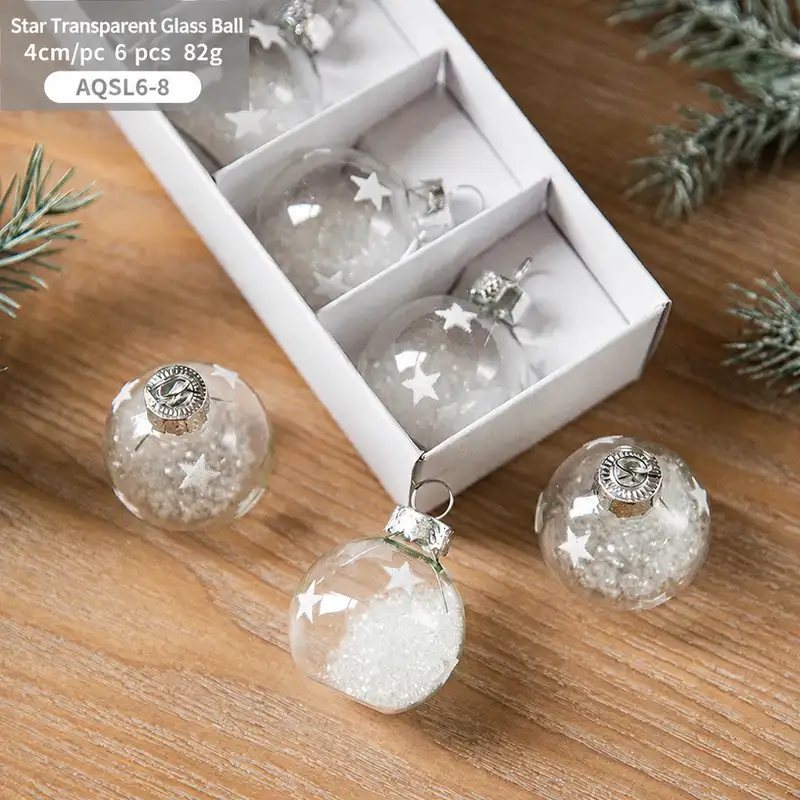 Boxed transparent glass Christmas ornaments with snowflake sequins