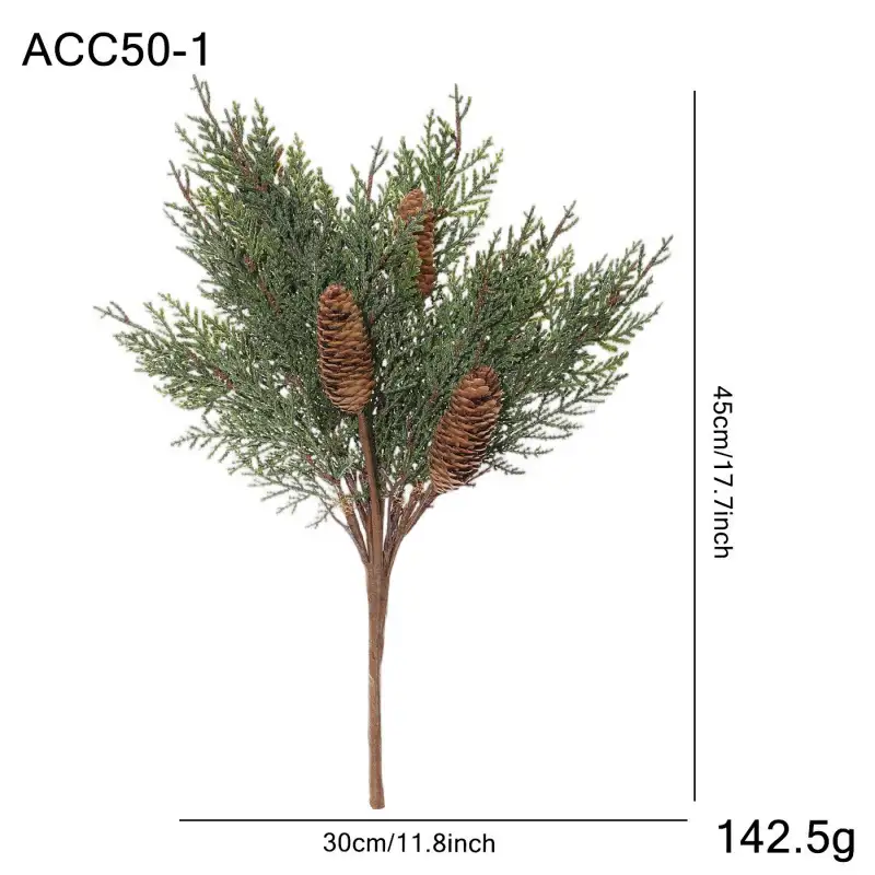 Artificial cedar branch decoration with red berries and pine cones