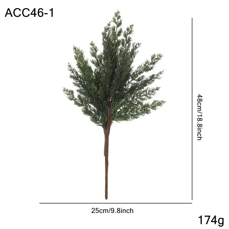 Artificial cedar branch decoration with red berries and pine cones