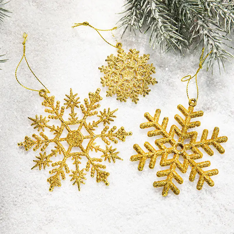Gold-glitter plastic snowflake Christmas tree ornament