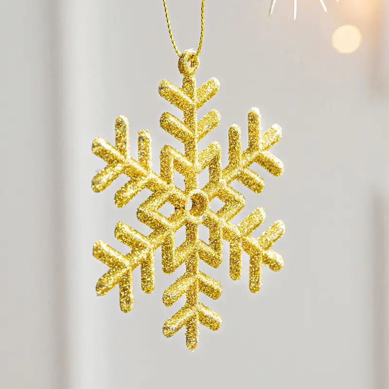 Gold-glitter plastic snowflake Christmas tree ornament