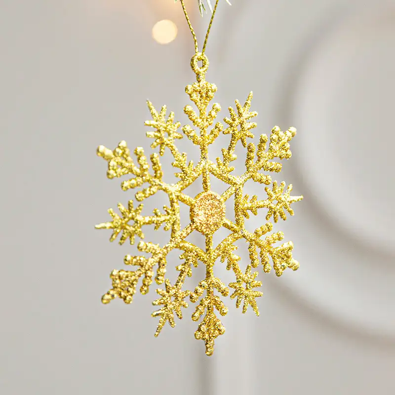 Gold-glitter plastic snowflake Christmas tree ornament