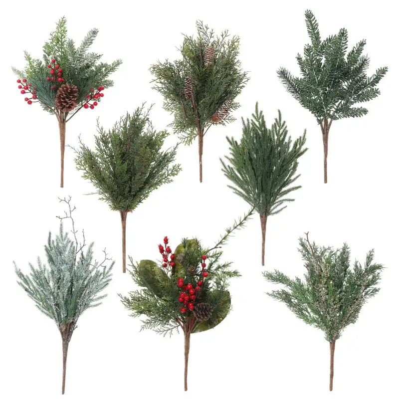Artificial cedar branch decoration with red berries and pine cones