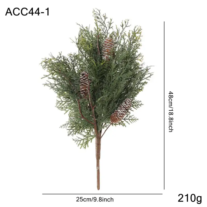 Artificial cedar branch decoration with red berries and pine cones
