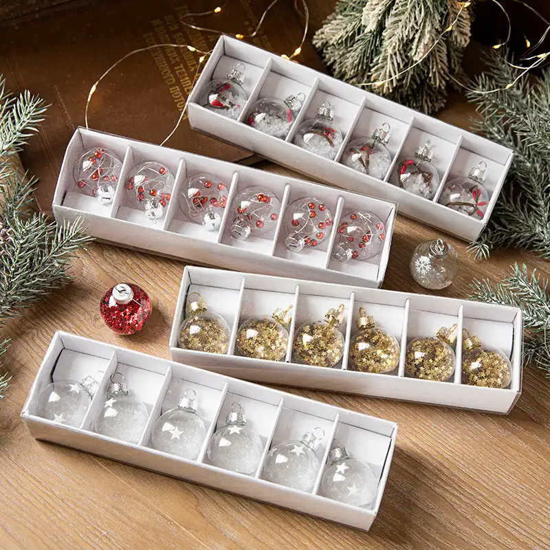 Boxed transparent glass Christmas ornaments with snowflake sequins