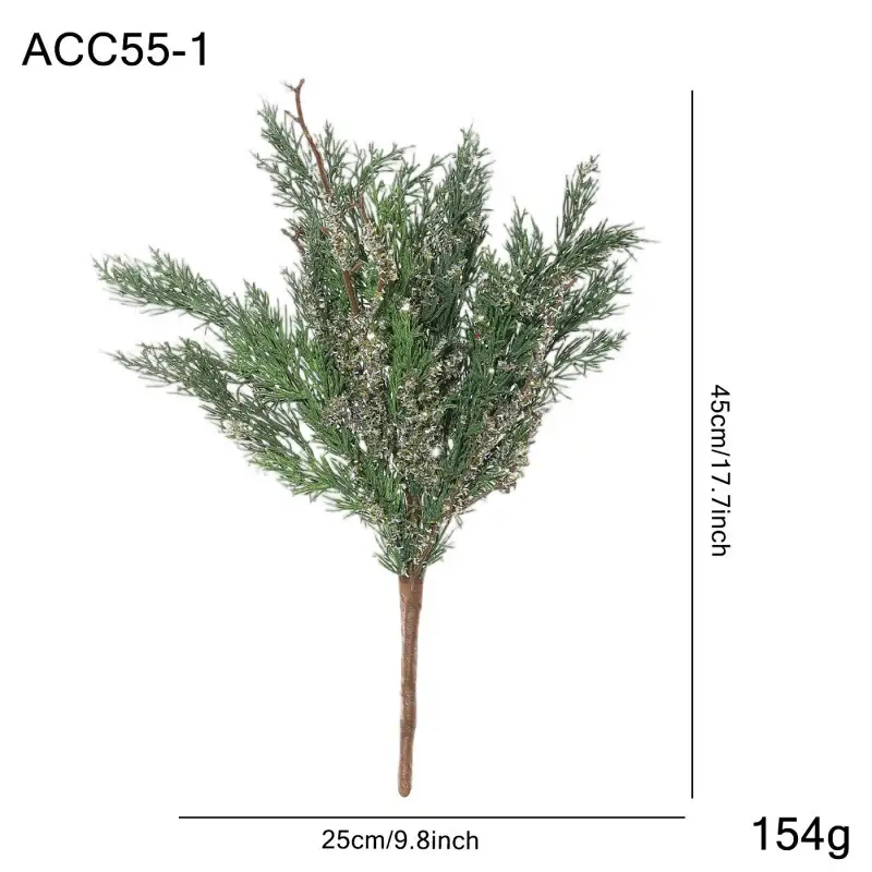 Artificial cedar branch decoration with red berries and pine cones