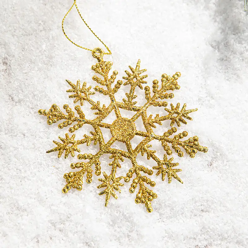 Gold-glitter plastic snowflake Christmas tree ornament