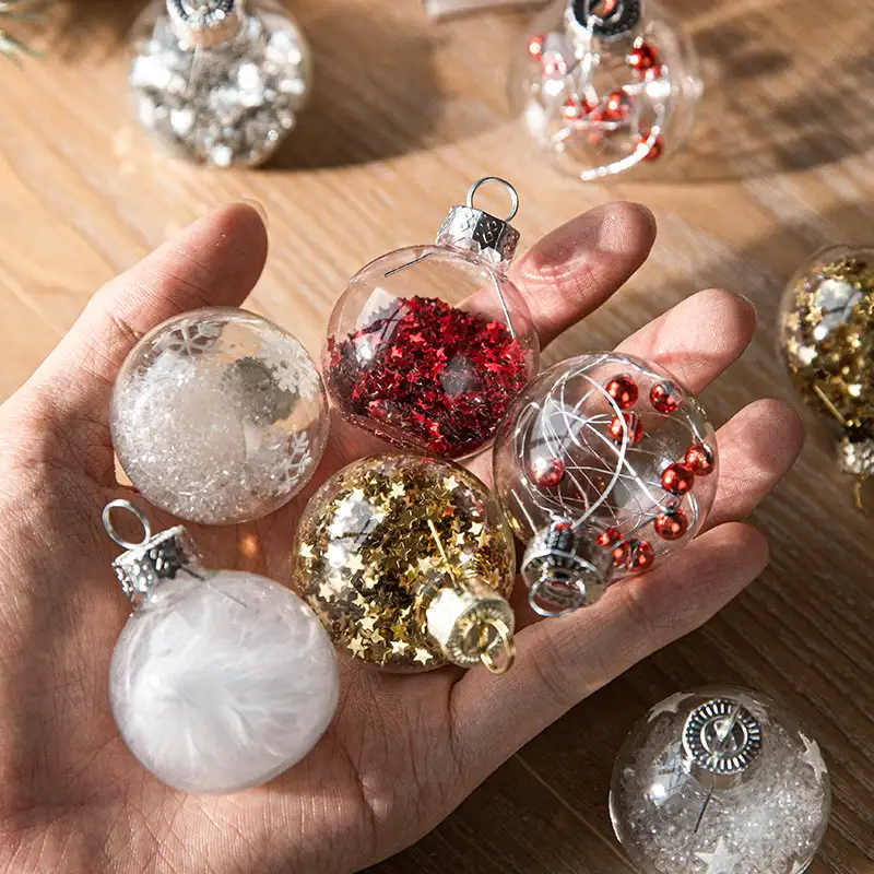Boxed transparent glass Christmas ornaments with snowflake sequins